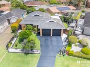 Immaculate 4 Bedroom Home Moments From the Beach