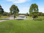 Immaculate Coastal Acreage Retreat From Every Aspect