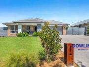 IMMACULATE FAMILY HOME WITH BUSHLAND FRONTAGE