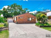 Immaculate Lowset Brick Home Private & Peaceful Living