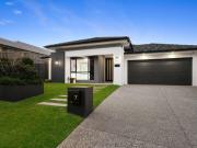 Immaculate Modern Living in Prestigious Stone Creek!