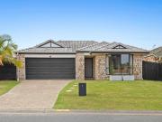 Immaculate Single Level Retreat Offering Modern Living...