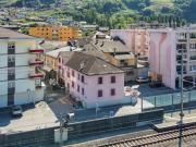 Immeuble à fort potentiel au centre de Saxon, face à la gare