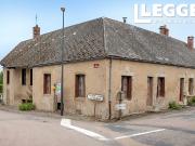 Immeuble à rénover composé de: une maison de quatre...