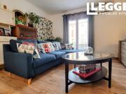 Immeuble mixte de 129m2: Commerce 42m² + Duplex T4 de...