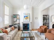 Impeccably Renovated Terrace in Highly Coveted Location