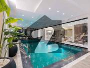 Indoor swimming pool 24 marla ultra modern full basement...