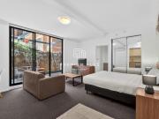 Investment Studio with Rare Courtyard & Car Space in...