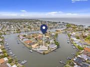 'JACARANDA POINT' CANAL DUPLEX WITH INGROUND...