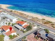 JUST 150 METRES TO THE WATER'S EDGE AT BLUE BAY