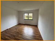 KOMFORTABLE ERDGESCHOSSWOHNUNG MIT BALKON ZENTRALE LAGE...