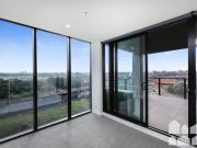 Large Apartment Offering Sweeping City, River & Track...