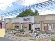 Large commercial lot for sale near side gate on don...