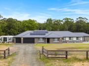 Large modern living meets relaxed acreage lifestyle