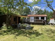 LE MAZEAU PROCHE RIVIERE Bungalow en bois surélevé vendu...