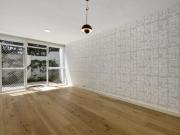 Leafy Ground Floor Sanctuary in Exclusive 'Toorak...