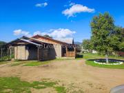 Leon Propiedades vende parcela con 2 casas y un galpón...