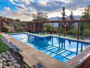 Leon Propiedades vende parcela con 2 hermosas casas y...