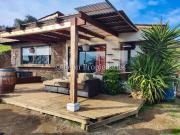 Leon Propiedades vende parcela con casa en sector lo...