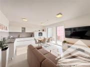 Lichtdurchflutete Neubauwohnung mit großem Balkon & TG...