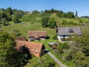 Liegenschaft mit Einfamilienhaus und Nebengebäuden nahe...