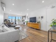 LIGHT FILLED APARTMENT WITH TWO OUTDOOR RETREATS...