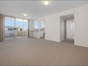 Light filled apartment with water views and CBD convenience