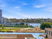 LIGHT FILLED CONTEMPORARY APARTMENT WITH RESORT STYLE...