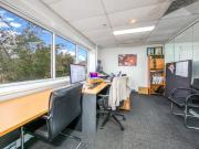 LIGHT FILLED EXECUTIVE OFFICE SPACE WITH PRIVATE AMENITIES!