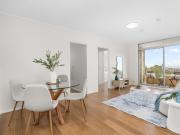 Light Filled & Renovated with Shimmering City Skyline &...