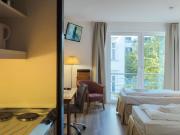 Light flooded apartment with two single beds, in the...