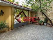 Linda casa assobradada no Santa Mena com 4 suítes