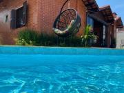 Linda casa com piscina a 100 metros da praia em Praia...
