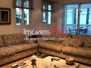 Linda casa em condomínio de 530m² com 4 suítes e 5 vagas