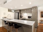 Live Among Landmarks in this Chic Harbourside Apartment