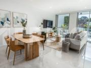 LIVE IN A SECLUDED SANCTUARY IN THE HEART OF VIBRANT...