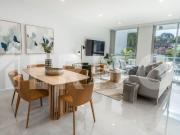 LIVE IN A SECLUDED SANCTUARY IN THE HEART OF VIBRANT...