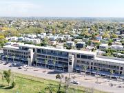 LOCAL COMERCIAL CON COCHERA PASEO DE COMPRAS HUDSON ZONA...