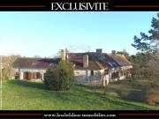 LONGÉRE EN PIERRES AVEC JARDIN ET DÉPENDANCES