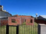 Lote con 2 casas en construcción