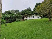 LOTE CON CASA PARA REMODELAR FRENTE A LA BARRA DE MANOLO...