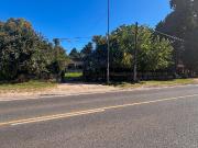 Lote con casa sobre Cno. Belgrano y 466 destino comercial