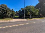 Lote con casa sobre Cno. Belgrano y 466 destino comercial