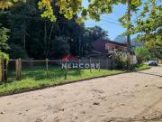 Lote em condomínio em Rua Um Massaguaçu Caraguatatuba/SP