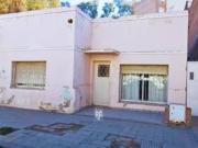 Lote en MICROCENTRO neuquino con casa y departamento...