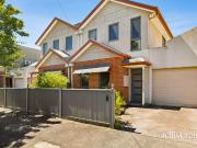 Low maintenance central townhouse in immaculate condition