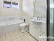 LOW MAINTENANCE LIVING CLOSE TO SHOPS & SCHOOLS!