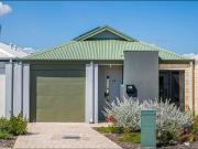 Low maintenance living in a walkable Harrisdale pocket