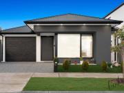 Low Maintenance Luxury in a Prime Location