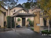 Low maintenance luxury in prestigious Heritage Country...